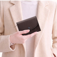Womens minimalist bifold wallet crafted from full grain leather dark brown